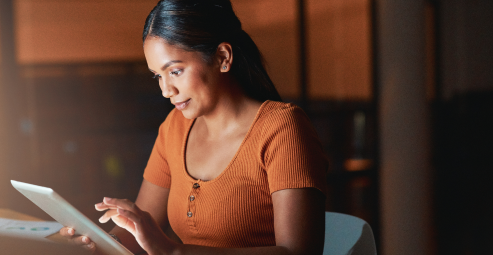 Woman using digital tablet